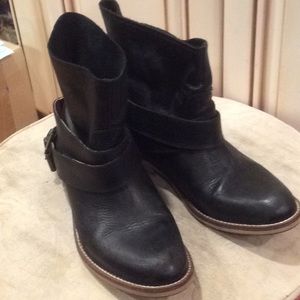 Black leather booties by Bronx